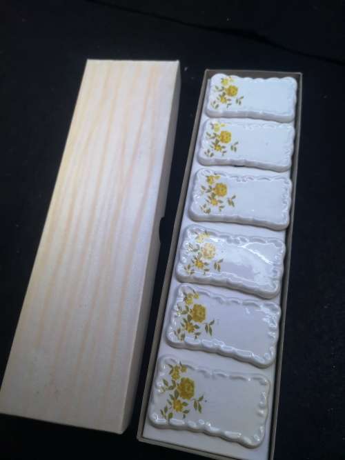 Yellow porcelain name placements