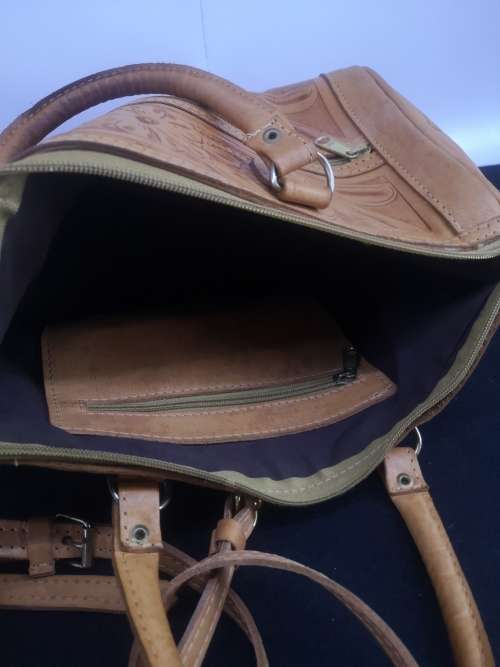 Hand crafted leather handbag with shoulder strap