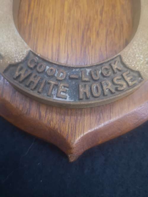 White Horse whiskey horse shoe plaque