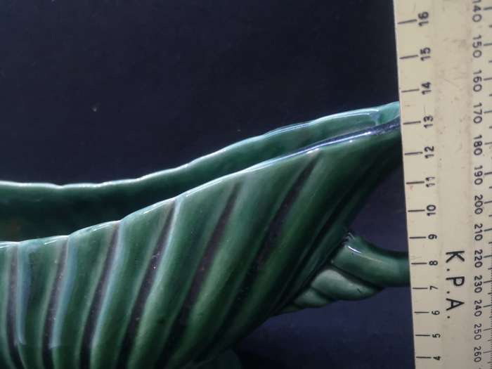 Vintage green vase - note the chip on the base - not noticeable when on display