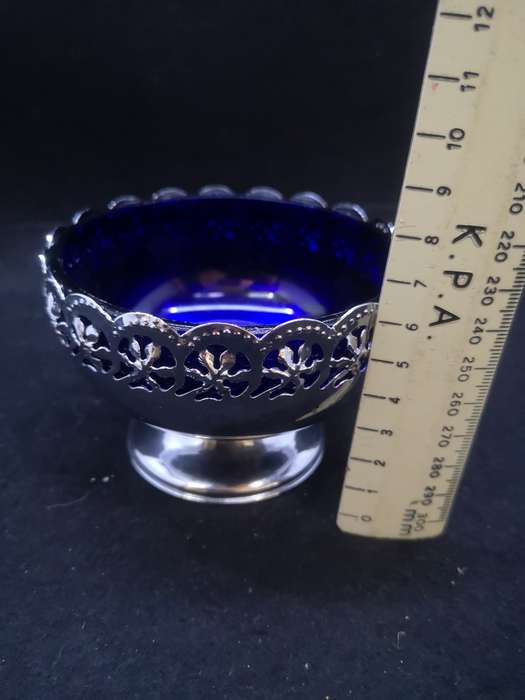 Blue glass lined candy dish