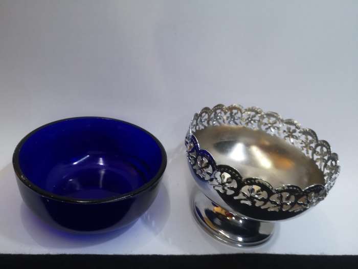 Blue glass lined candy dish
