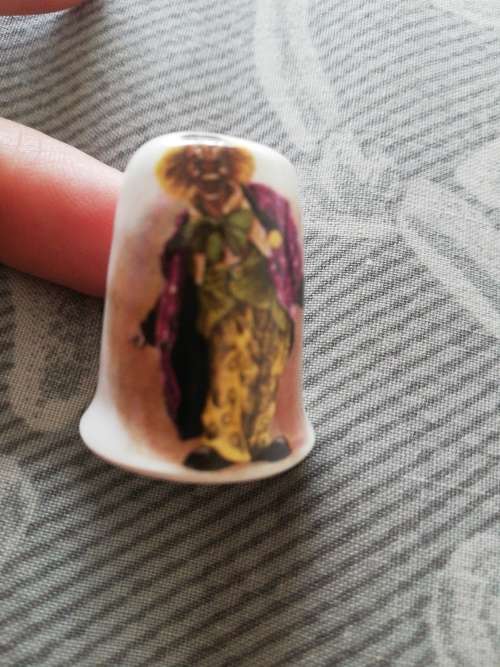 Clown Porcelain thimble, slight imperfection