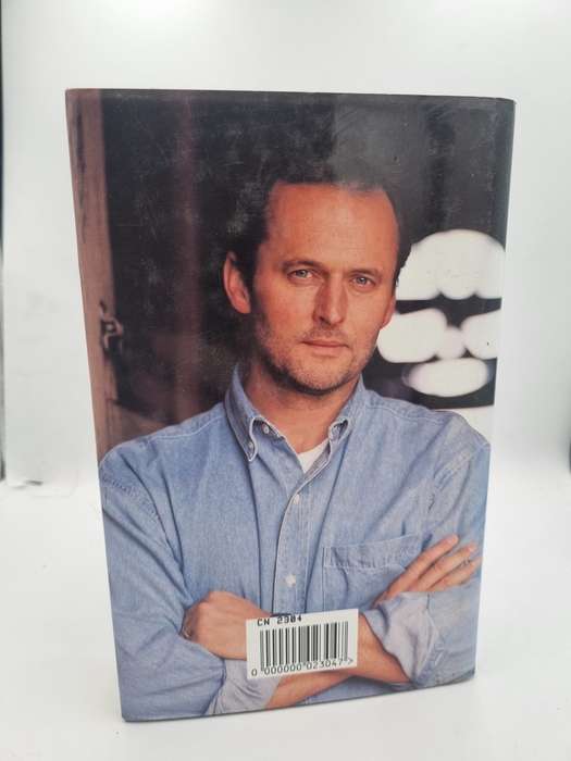 John Grisham ~ The Rain Maker | Small format hard cover in fair condition