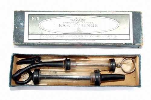 Antique `SAVARS EAR SYRINGE` in original box plus extra syringe and dropper.