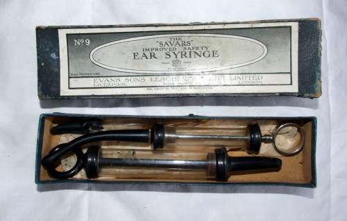 Antique `SAVARS EAR SYRINGE` in original box plus extra syringe and dropper.