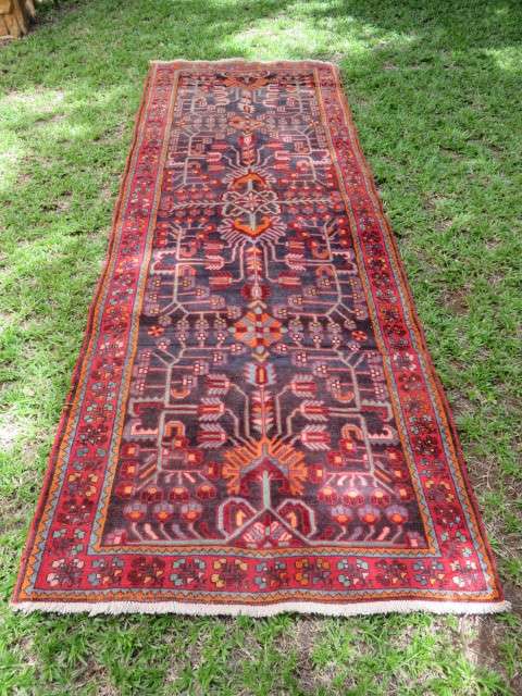 Hand knotted Persian runner.