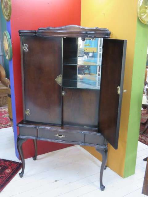 Dark wood drinks cabinet
