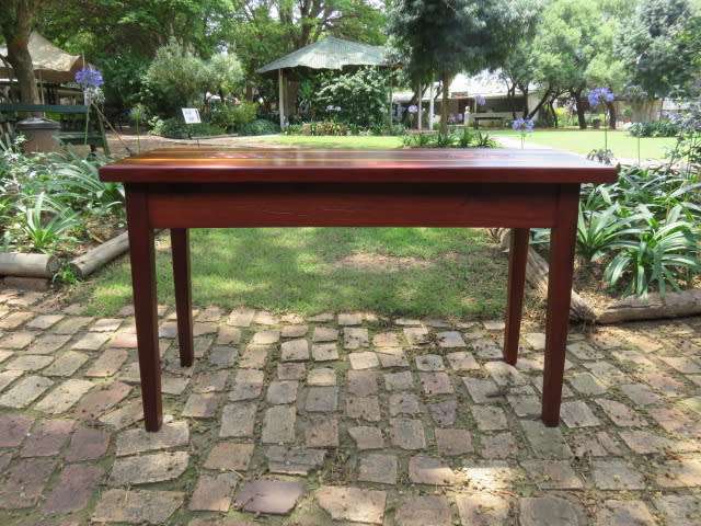 Rhodesian teak table with inlaid celtic design.