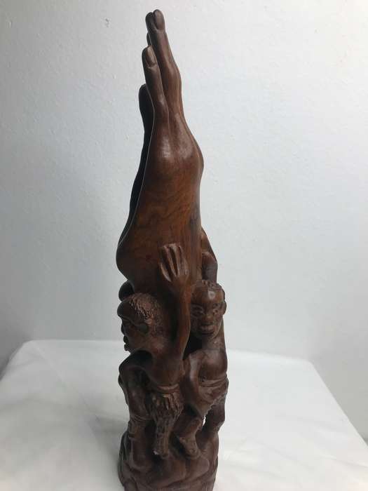 Wood Art Hand Carved Sculpture in Ebony one Piece Family holding up a Hand 35cm x 10cm