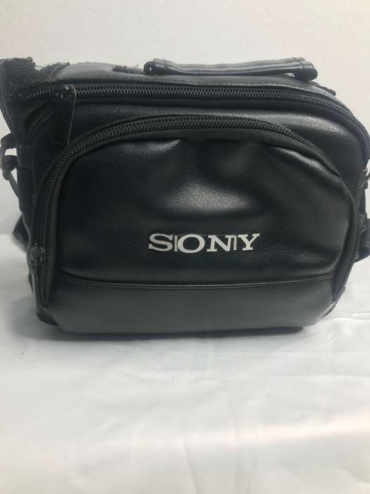 Sony Camera Bag Black Leather second hand front pocket, divider inside one zip off track