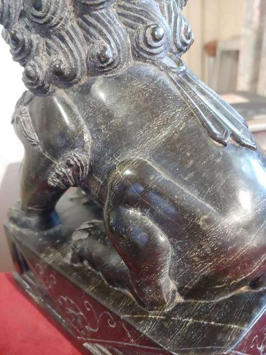 A pair of Antique Chinese Foo Dogs (Lions)