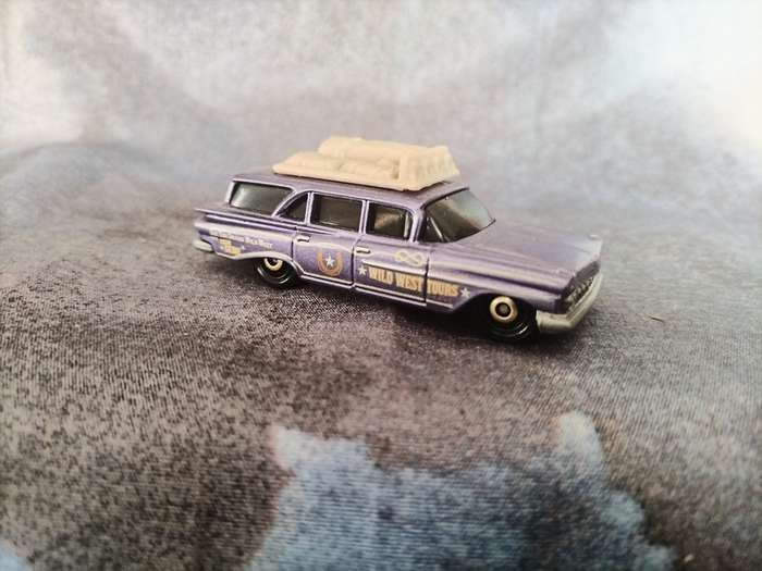 Vintage Purple wild west tours station wagon