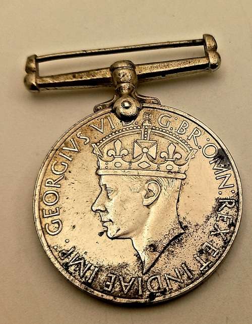 WW2 1939-1945 Full size Medal issued to 75641 T.O Weir engraved