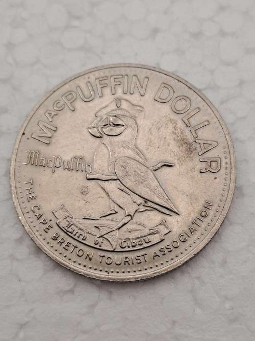 Collectable 1979  Canada MacPuffin Dollar Cape Breton Island, Nova Scotia- Tade Token