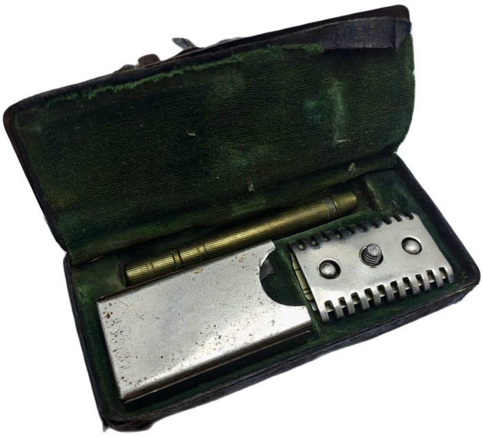 Antique Mens traveling Razot set in Tin . outside cover of tin in bad shape