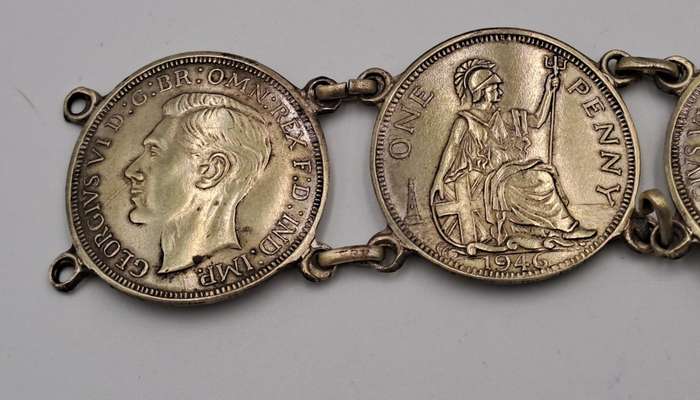 Part of a Vintage Bracelet with 1946 Pennies Cut In Half