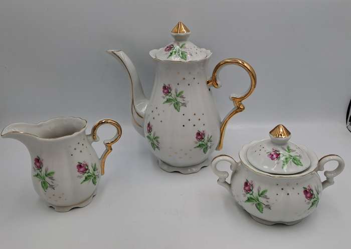 17 Pc Porcelain Teaset  Rose design - 1 cup was replaced with a different Pattern-Small Set
