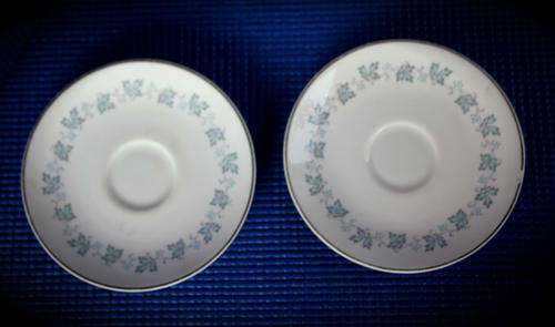 Royal Doulton H.4948 Lyric 2 saucers -128mm..one has a chip