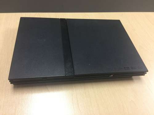 PS2 Console + Controller + 64mb Memory Card + 6 Games