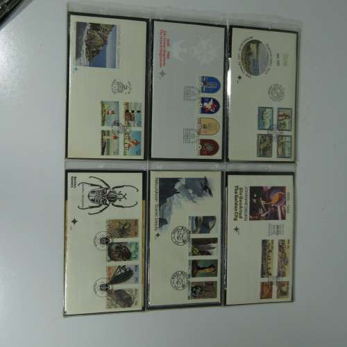 Collection of over 60 SA First Day covers and lot of extra items