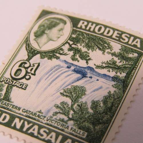 Rhodesia and Nyasaland SACC No. 24 Normal 6d mint hinged stamp plus error stamp