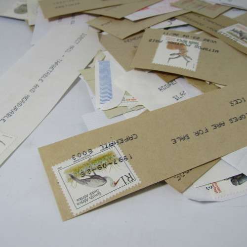 Many hundreds of stamps and postmarks on cover - unchecked