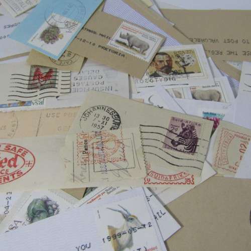 Many hundreds of stamps and postmarks on cover - unchecked