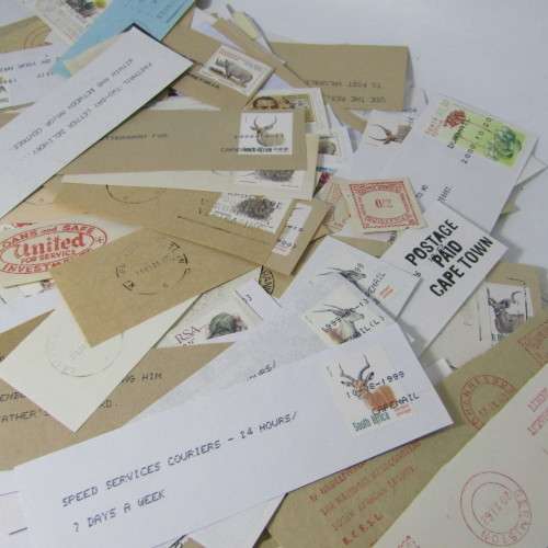 Many hundreds of stamps and postmarks on cover - unchecked