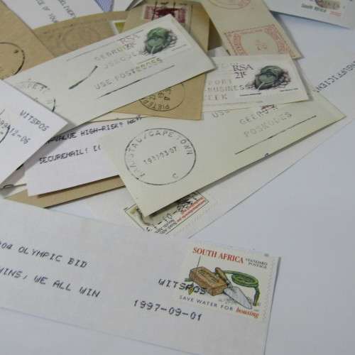 Many hundreds of stamps and postmarks on cover - unchecked