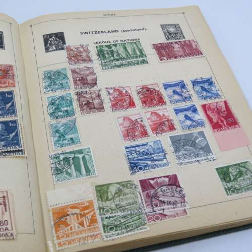Postal stamp album of the world with over 1300 old stamps - Given to `Alice` in 1937