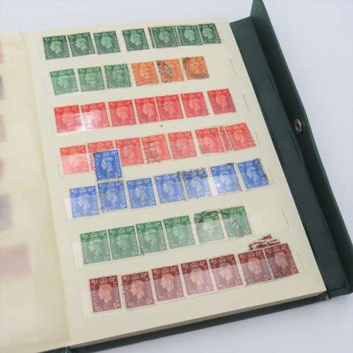 18 Page stamp album with over 700 British stamps - Including penny brown and some scarcer stamps