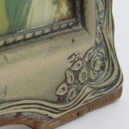 Antique EPNS frame on wooden backing