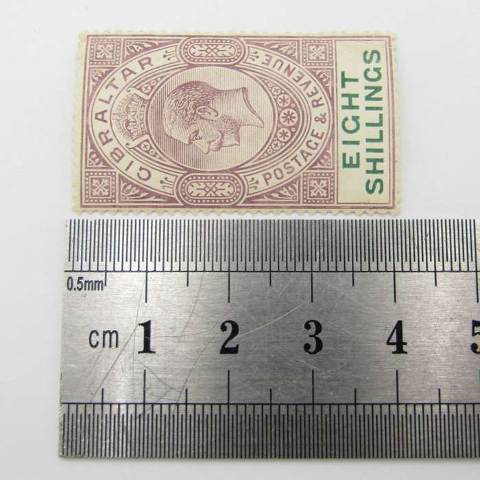 Gibraltar SG 84 - creased light hinged 8 shillings stamp
