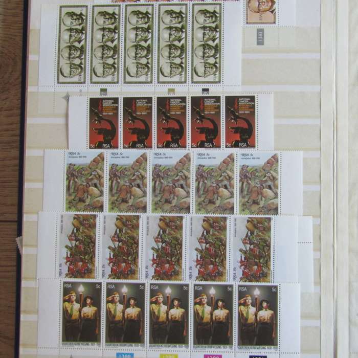 Stamp album with about 850 stamps - most in blocks or control blocks - some early ones