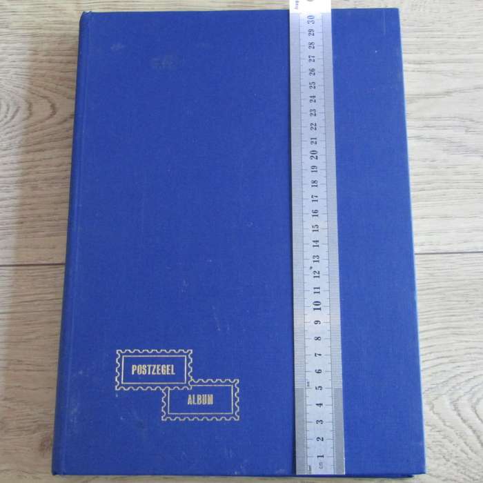 Stamp album with about 850 stamps - most in blocks or control blocks - some early ones