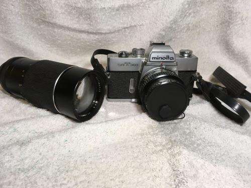 Vintage Minolta SRT303 c/w 50mm Lense + Bushnell Automatic 1:3,5 1=200mm Lense