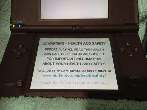 Nintendo DS XL Console Burgundy c/w new generic charger and stylus