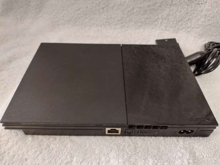 Playstation 2 - Black Slim c/w 1 x New Generic Controller, AV Cable & Power Cord
