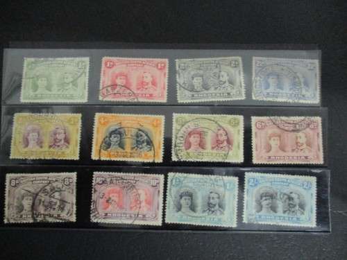 RHODESIA BSAC 1910 DOUBLE HEADS .UNCHECKED 12 FINE USED STAMPS .