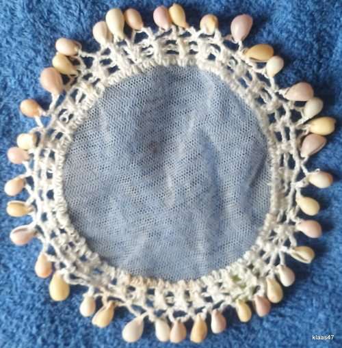 Net Jug Cover with crochet edge and Sea Shells