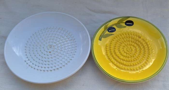 One Porcelain and One Melamine Olive Serving Plates