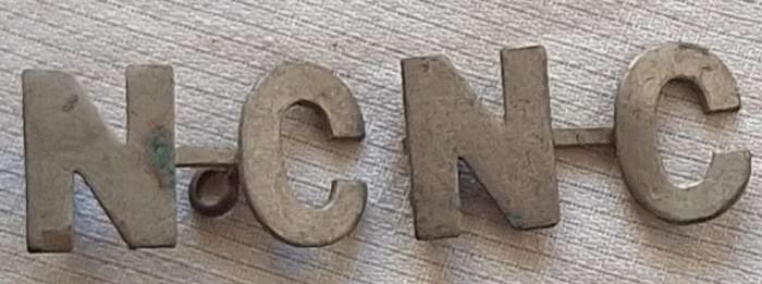 Natal Carbineers White Metal Shoulder Title 1899-1902 with One Lug Missing