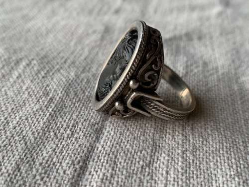 Back cameo set in sterling silver ring