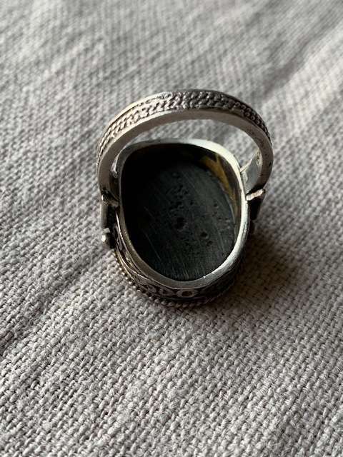 Back cameo set in sterling silver ring