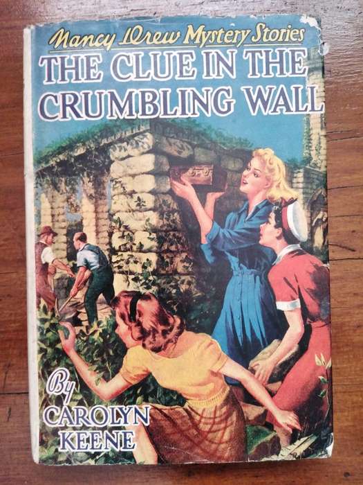 The Clue in the Crumbling Wall - Carolyn Keene. Nancy Drew -MerlinsArrow Some damage to Jacket