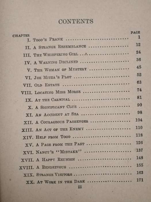 The Whispering Statue - Carolyn Keene. Nancy Drew - 1937 217 pages Some damage to Jacket MerlinsArro