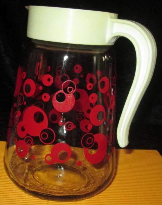 Home & Living-Kitchen ware-Consol Glass Jug with original plastic top. Reto vintage with red circle