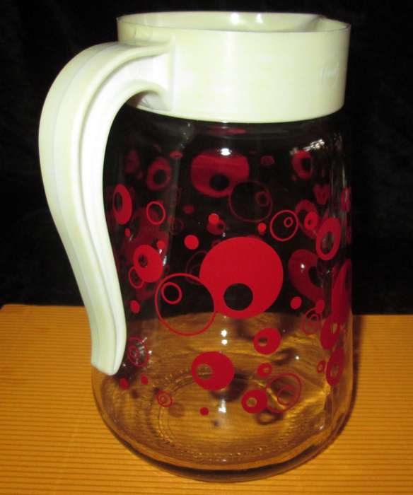 Home & Living-Kitchen ware-Consol Glass Jug with original plastic top. Reto vintage with red circle