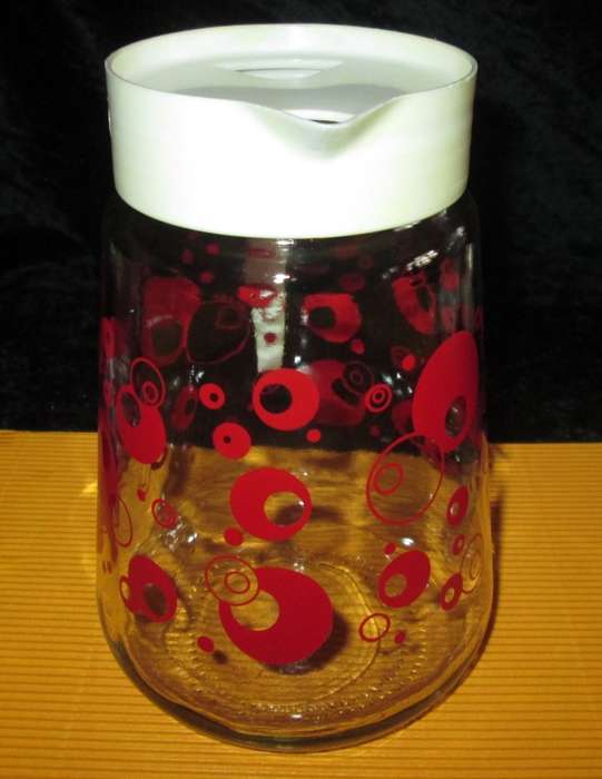 Home & Living-Kitchen ware-Consol Glass Jug with original plastic top. Reto vintage with red circle